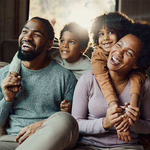 Happy African American family enjoying in their time at home.